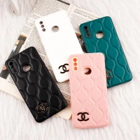 قاب پافر چرمی طرح Chanel محافظ لنزدار Samsung Galaxy A10s