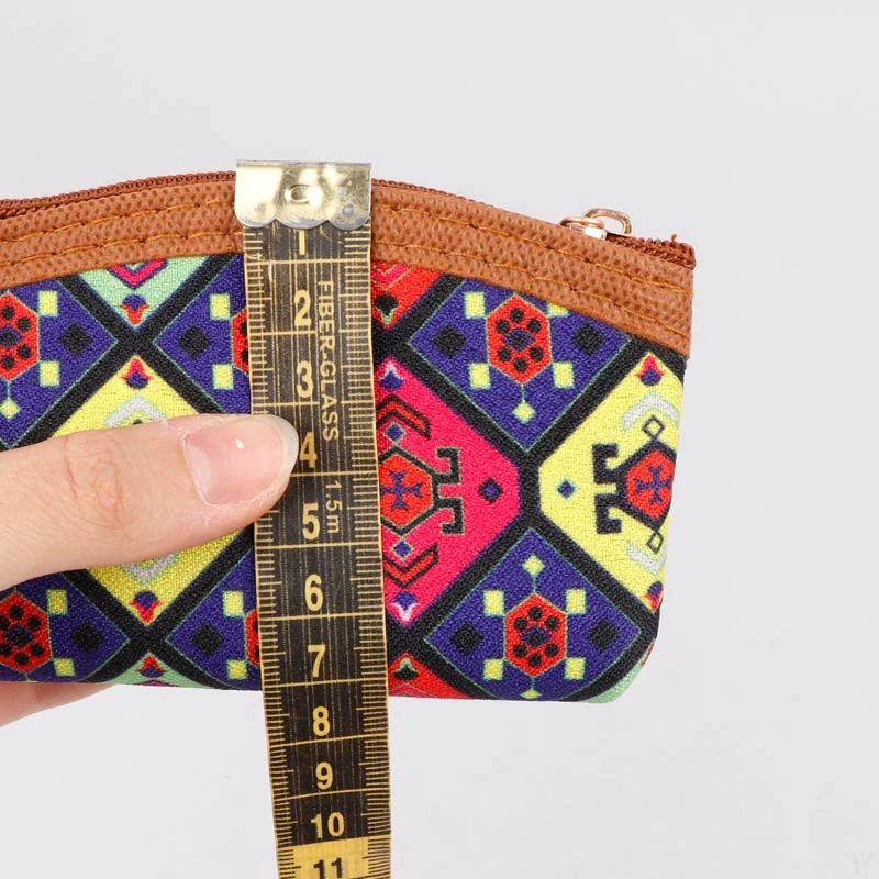 کیف هندزفری چرمی طرح گل مستطیل نیم گرد