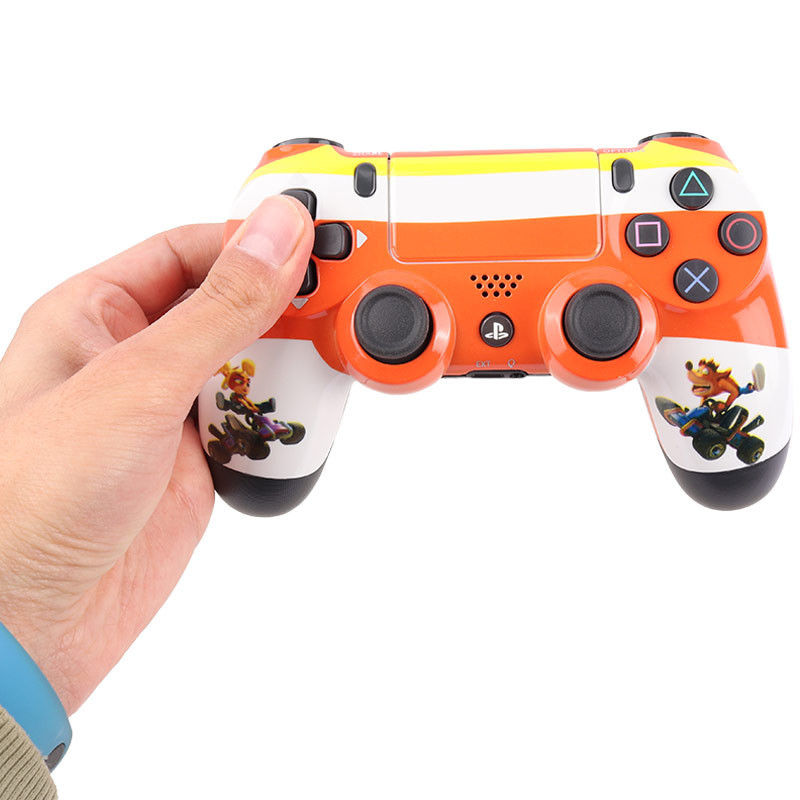دسته بازی بی سیم SONY PlayStation 4 DualShock 4 High Copy طرح کراش نارنجی سفید