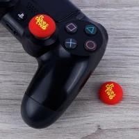 روکش آنالوگ دسته بازی Play Station/XBOX طرح It Takes Two قرمز زرد
