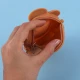 کیف هندزفری سیلیکونی بنددار خرسی کد 2