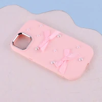قاب سیلیکونی آیفون iPhone 13 / 14 پاپیونی مرواریدی دور محافظ متال