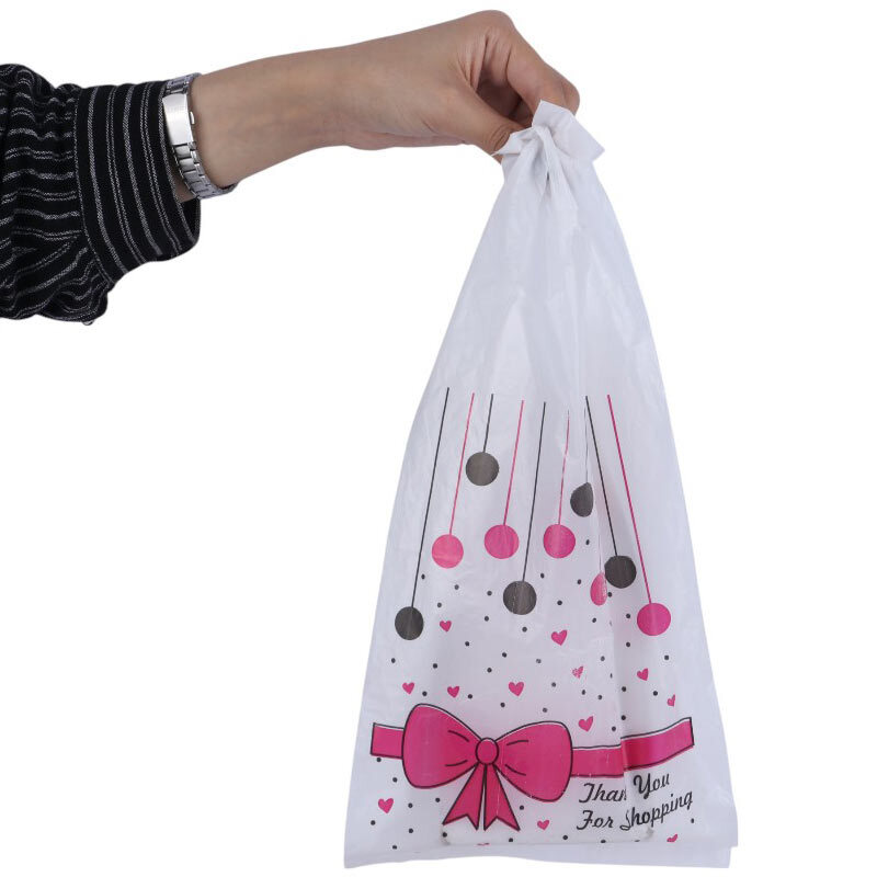 نایلون دسته دار طرح فانتزی سایز 30*40 سانتی متر بسته 1 کیلویی