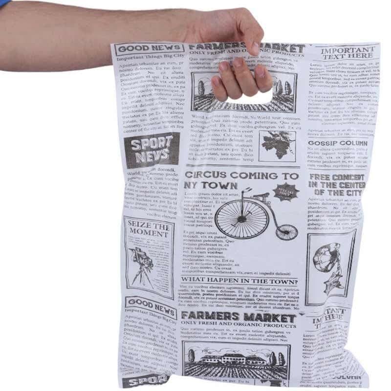 نایلون دسته دار طرح روزنامه سایز 50*35 سانتی متر بسته 1 کیلویی