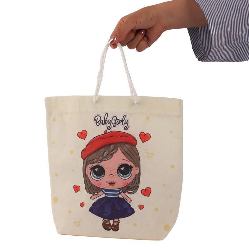ساک دستی پارچه ای طرح کارتونی بسته 12 عددی