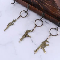 جاکلیدی فلزی طرح تفنگ برنزی