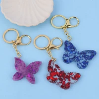 جاکلیدی رزینی گلد طرح پروانه شب تاب