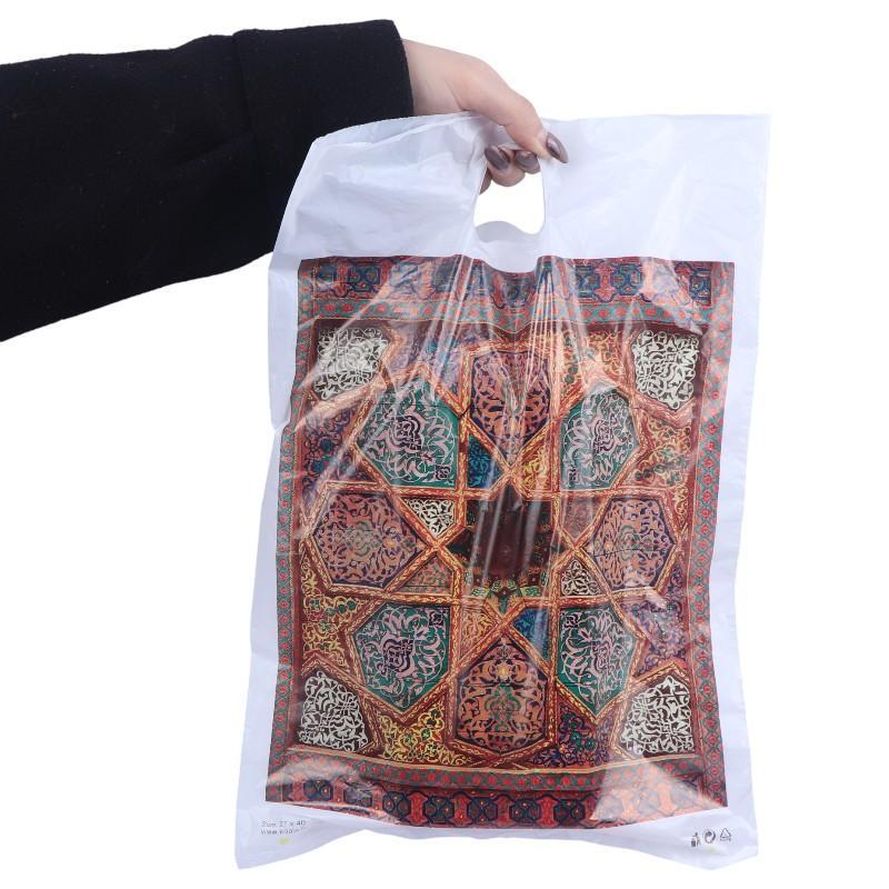 نایلون دسته موزی کوالا طرح فانتزی سایز 40*27 سانتی متر بسته 100 عددی