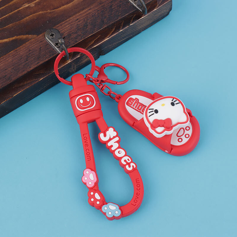 جاکلیدی سیلیکونی اسپینر دار طرح دمپایی + بند آویز