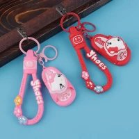 جاکلیدی سیلیکونی اسپینر دار طرح دمپایی + بند آویز