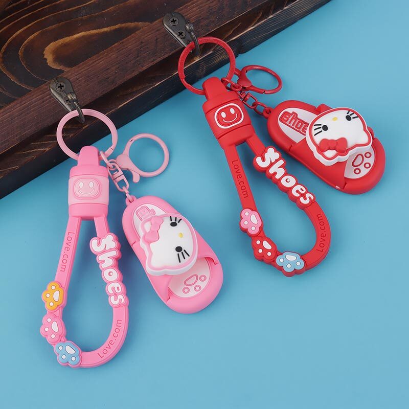 جاکلیدی سیلیکونی اسپینر دار طرح دمپایی + بند آویز