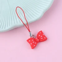 آویز فلش و موبایل طرح پاپیون قرمز