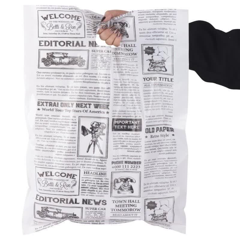 نایلون دسته دار طرح روزنامه سایز 55*40 سانتی متر بسته 1 کیلویی