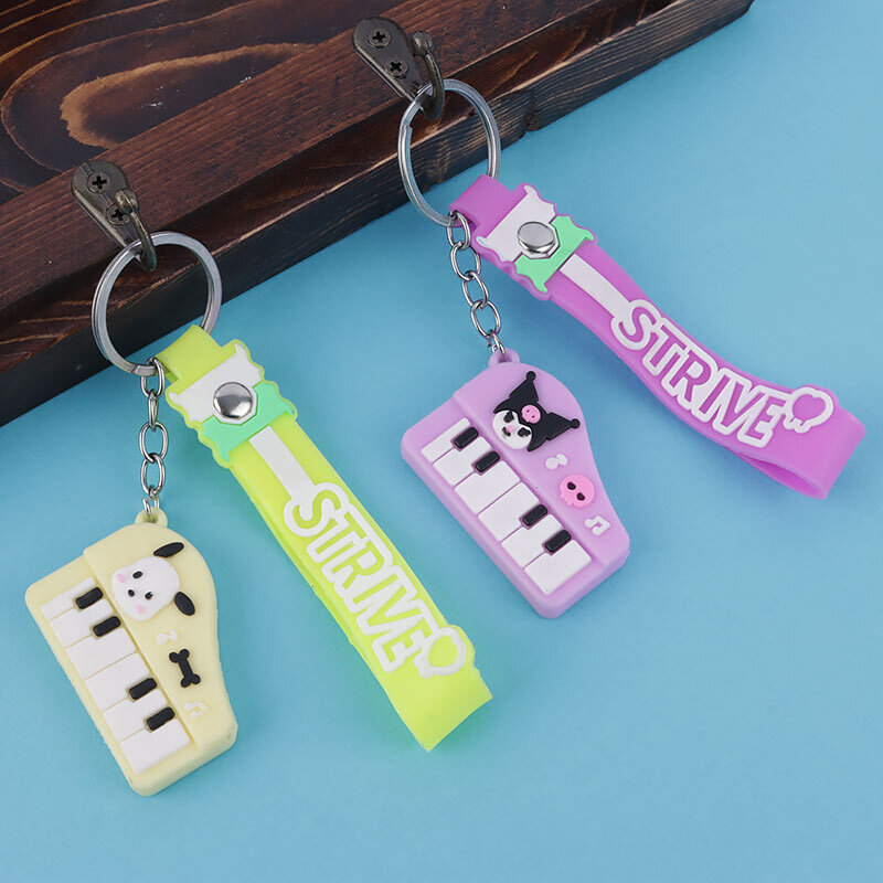 جاکلیدی سیلیکونی طرح پیانو + بند آویز