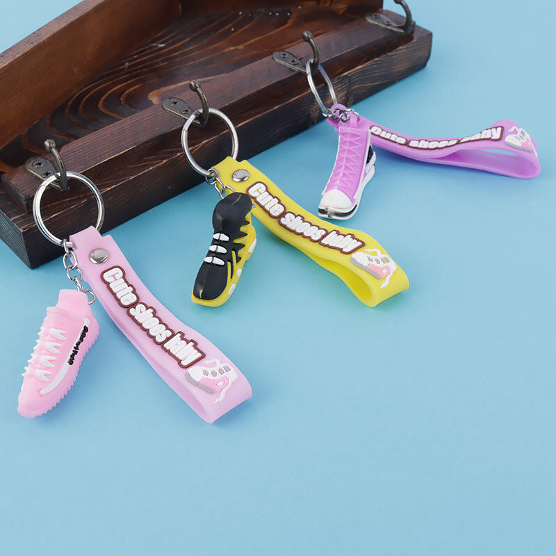 جاکلیدی سیلیکونی طرح کفش میکس + بند آویز