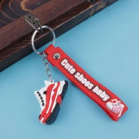 جاکلیدی سیلیکونی کفش لژ دار + بند آویز