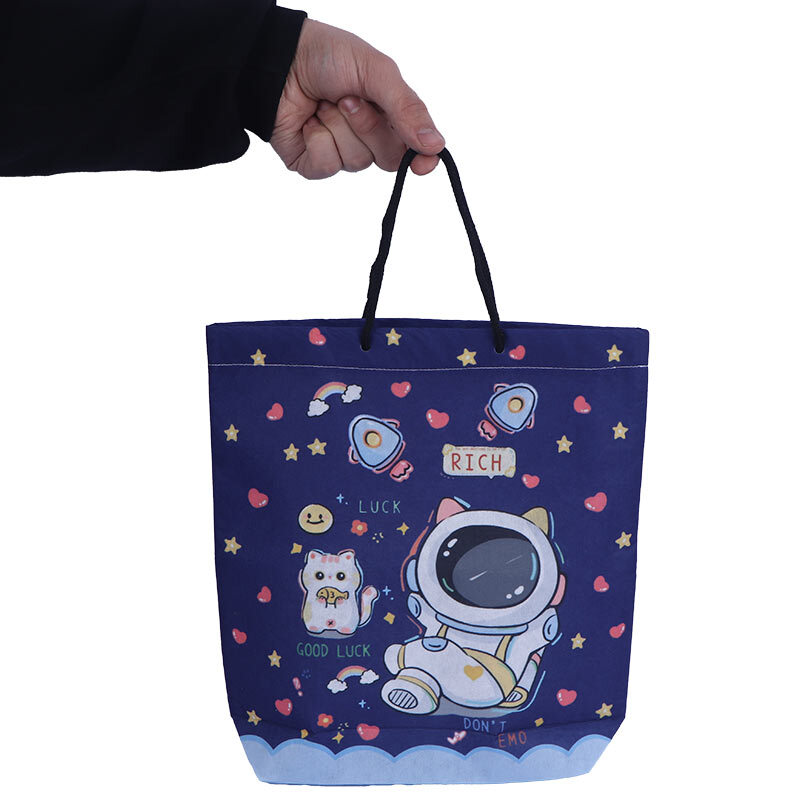 ساک دستی پارچه ای طرح فضانورد پارسام بسته 12 عددی