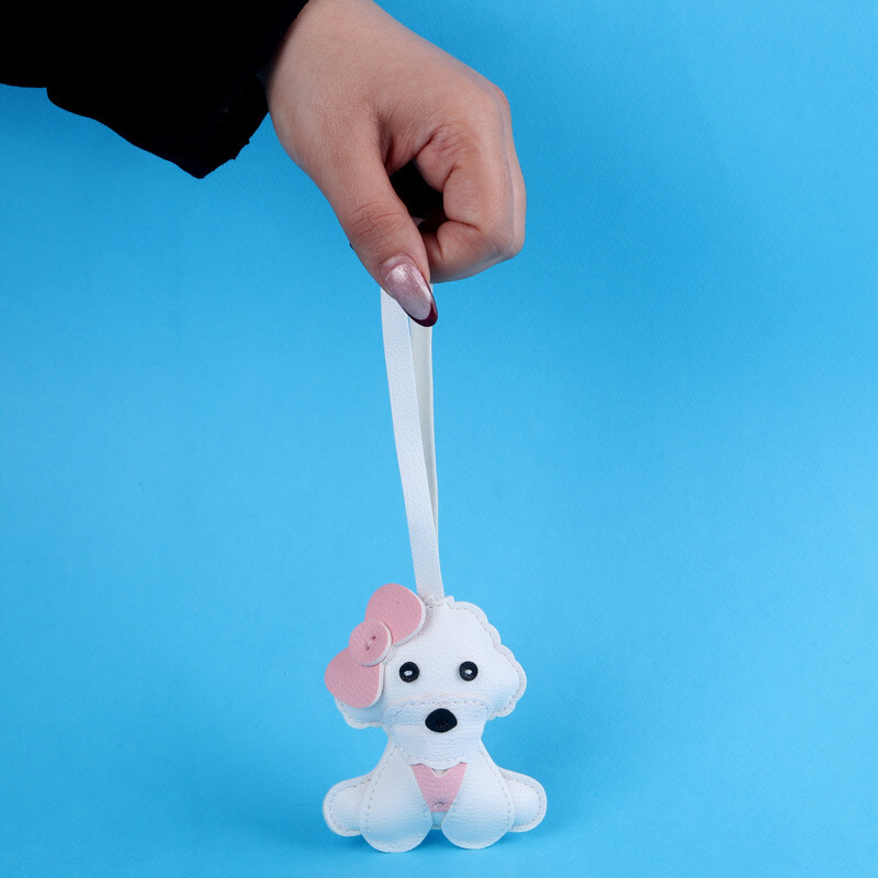 آویز کیف چرمی طرح سگ سفید