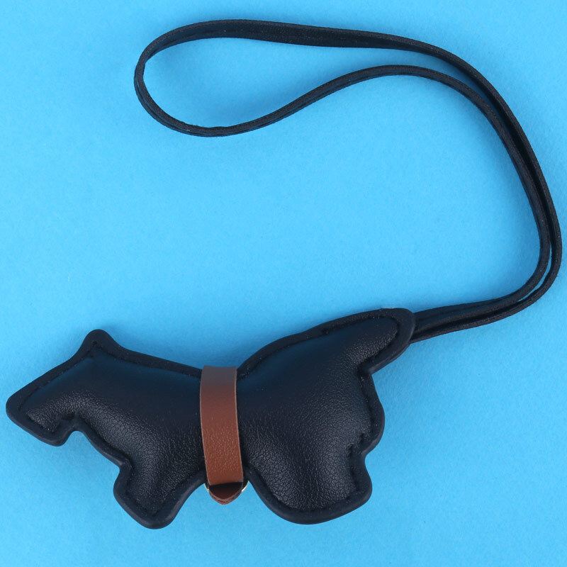 آویز کیف چرمی طرح سگ سیاه
