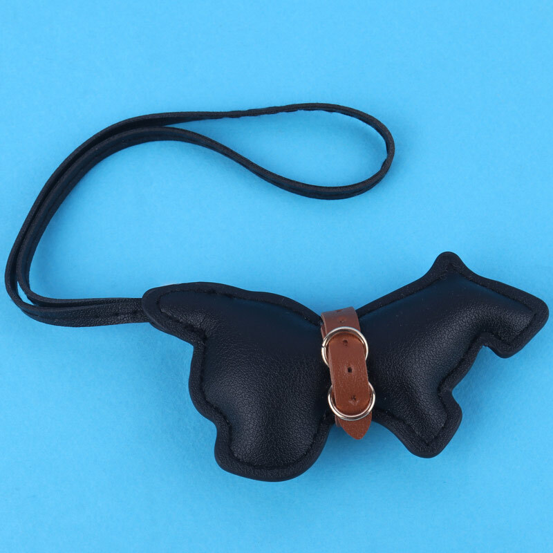 آویز کیف چرمی طرح سگ سیاه