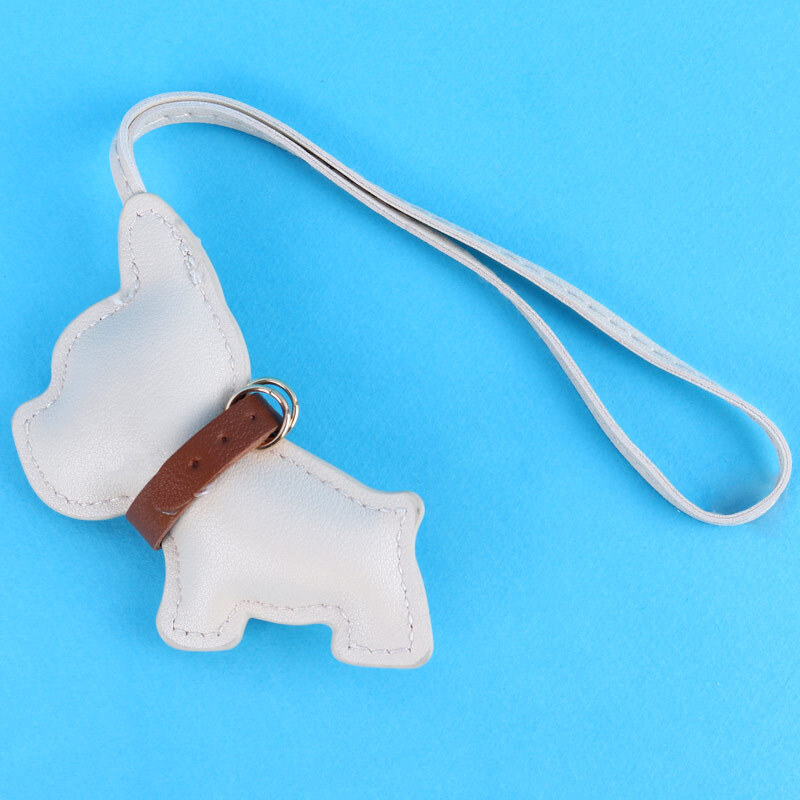 آویز کیف چرمی طرح سگ کرمی