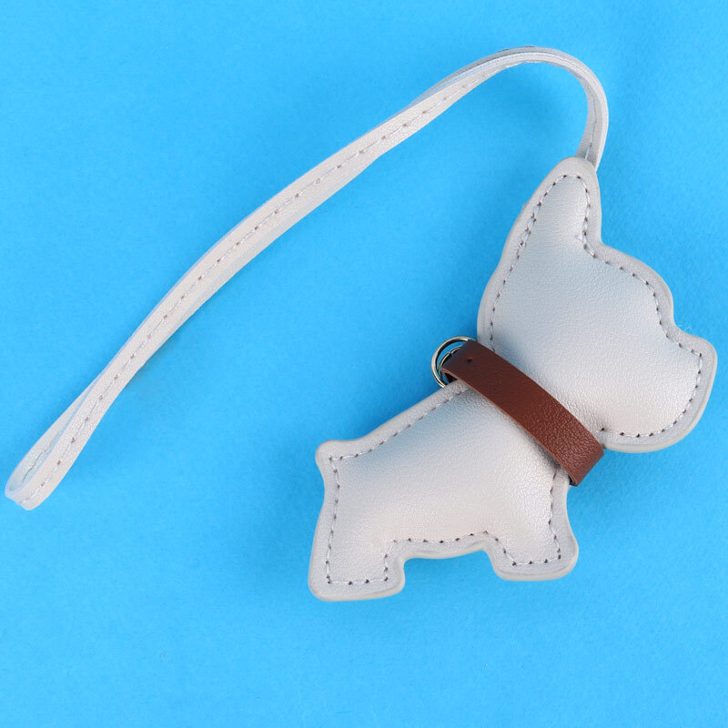 آویز کیف چرمی طرح سگ کرمی