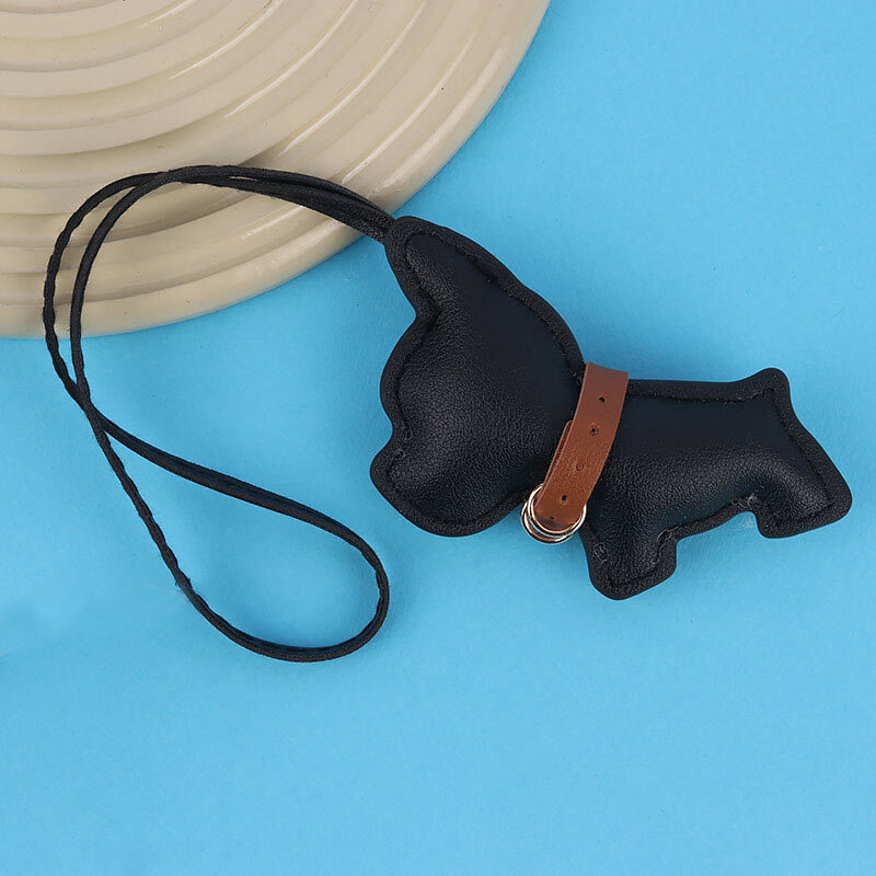 آویز کیف چرمی طرح سگ سیاه