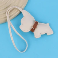 آویز کیف چرمی طرح سگ کرمی