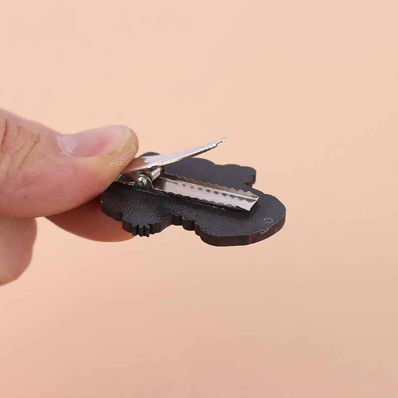 گیره سر پارسام طرح دختر گل به دست کد 1010057