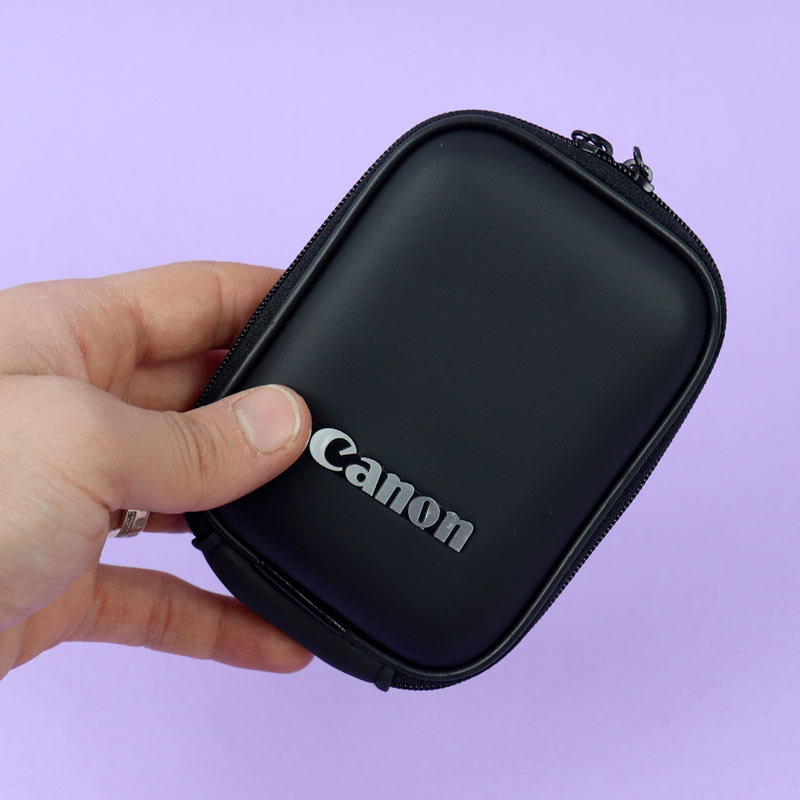 کیف چرمی شارژر و هندزفری Canon