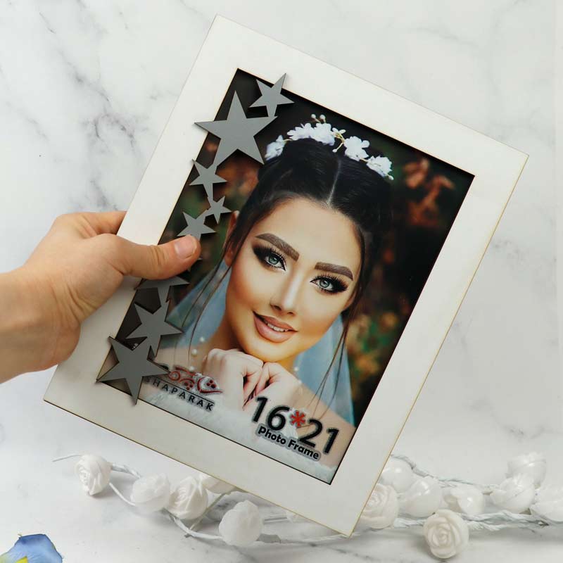 قاب عکس شاپرک طرح ستاره نقره ای 21*16 سانتی متر