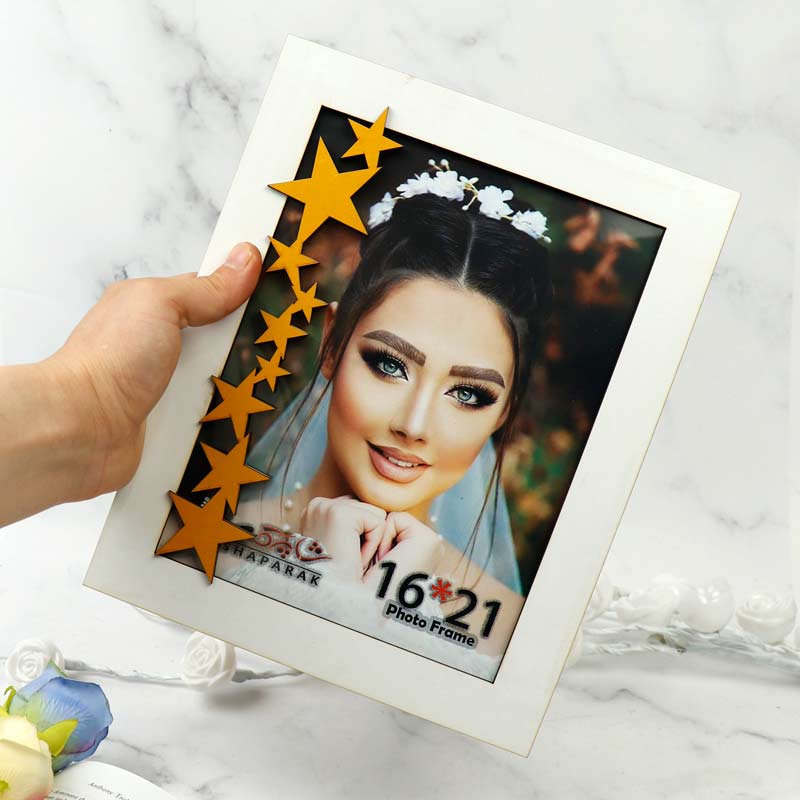 قاب عکس شاپرک طرح ستاره طلایی 21*16 سانتی متر