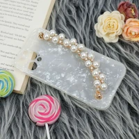 قاب محافظ لنزدار ماربل هولدر دستی مرواریدی iPhone 12 Pro