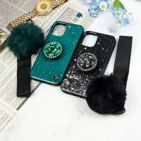 قاب ماربل طلایی پوم پوم دار + پاپ سوکت الماسی آیفون iPhone 12 Mini