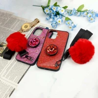 قاب ماربل طلایی پوم پوم دار + پاپ سوکت الماسی آیفون iPhone 12 Pro