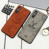 قاب چرمی سامسونگ Galaxy A02 طرح گوزن محافظ لنزدار