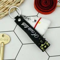 جاکلیدی سیلیکونی + بند آویز سگ سفید سری C