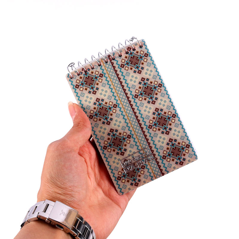 دفترچه یادداشت سیمی 100 برگ نهال آلما کد 1343 بالا بازشو