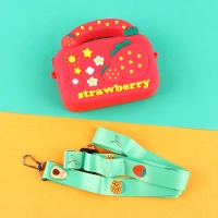 کیف هندزفری سیلیکونی بنددار چمدانی Strawberry