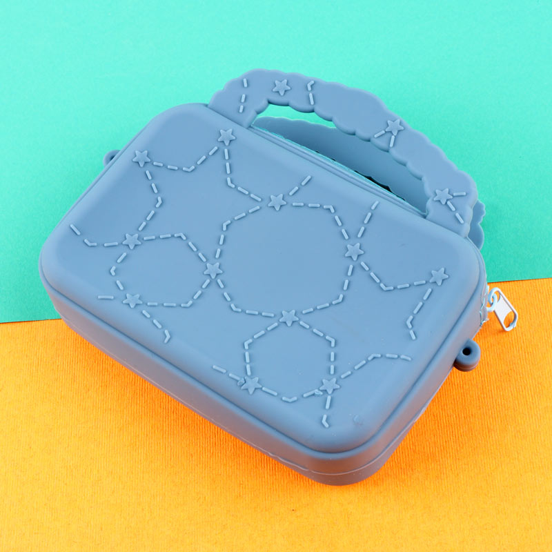 کیف هندزفری سیلیکونی بنددار چمدانی Stitch