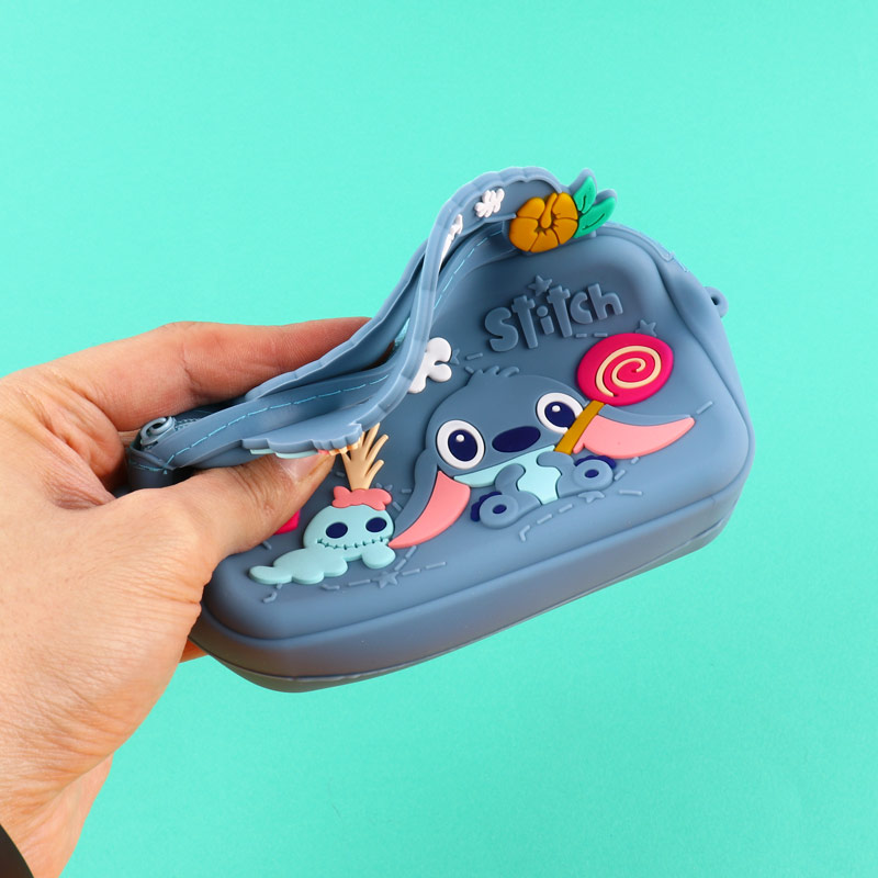کیف هندزفری سیلیکونی بنددار چمدانی Stitch